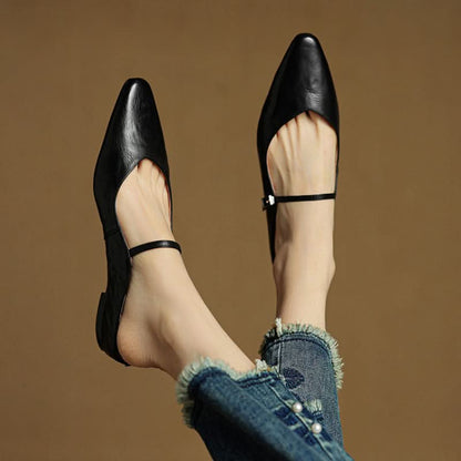 Lace Mules With a Peep-Toe Finish