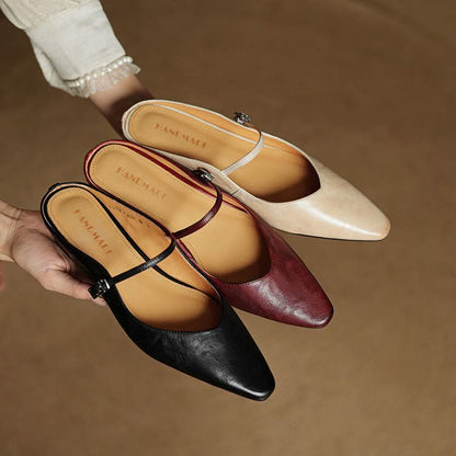 Lace Mules With a Peep-Toe Finish