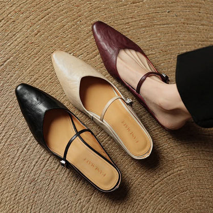 Lace Mules With a Peep-Toe Finish