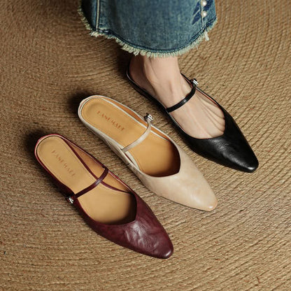 Lace Mules With a Peep-Toe Finish