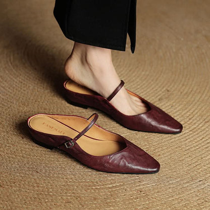 Lace Mules With a Peep-Toe Finish